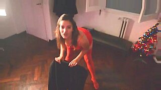 brunette in red dress masturbates