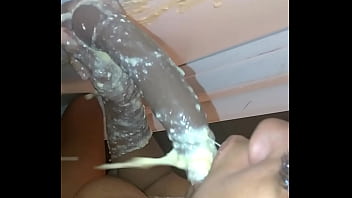extremely long dildo completely inserted in her throat