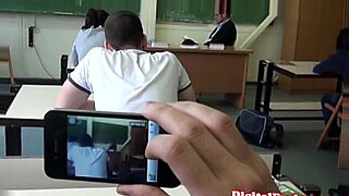 cute schoolgirl fingering herself on the desk in the classroom