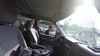 wife sue back seat car with black stud while husband drives