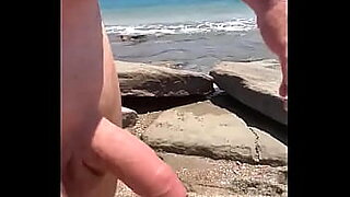 asian girl plays and pees at the beach