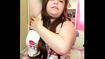 girl rubs toy on her hairy armpits