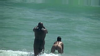 horny girl sunbathing on the beach